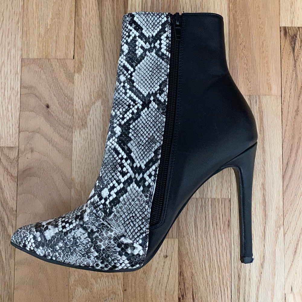 Snakeskin high boot